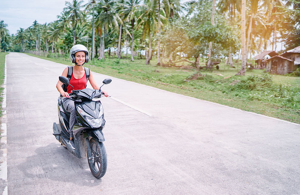 Riding scooter in Sri Lanka