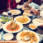 Family having Sri Lankan rice and curry