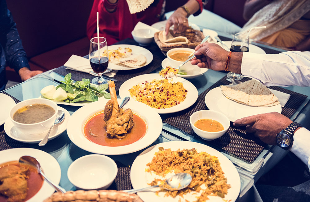 Family having Sri Lankan rice and curry