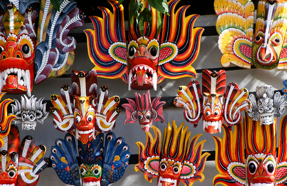 Colorful carved wood dance masks of Sri Lanka